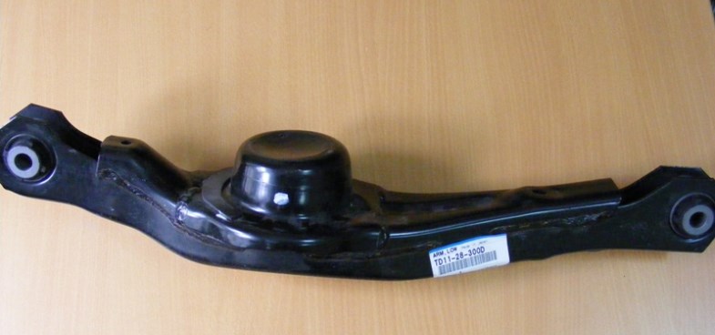 Mazda TD11-28-300D Rear lower cross arm TD1128300D: Buy near me in Poland at 2407.PL - Good price!