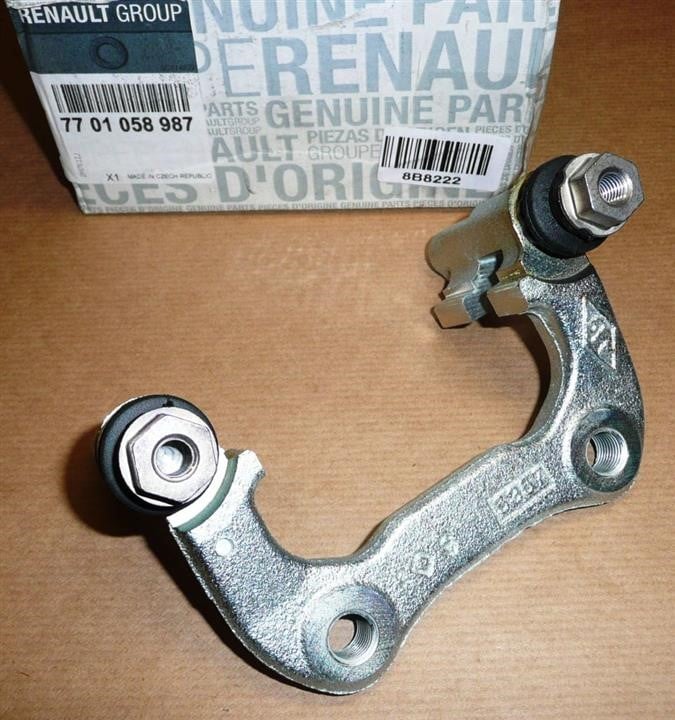 Renault 77 01 058 987 Brake caliper bracket 7701058987: Buy near me in Poland at 2407.PL - Good price!