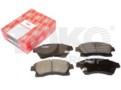 Toko T2101034L Front disc brake pads, set T2101034L: Buy near me in Poland at 2407.PL - Good price!